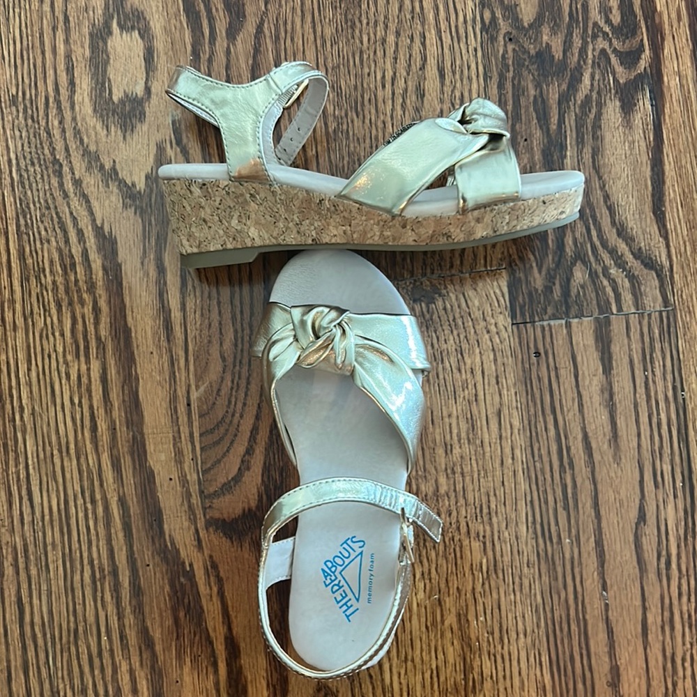 Girls gold wedges. Never worn.